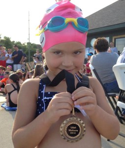 Lilah swim team award